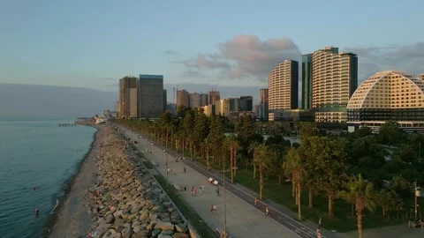 Flying over the beach of Batumi during the golden hour Vidéo 256606792