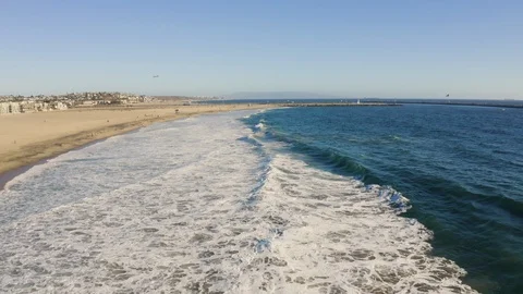 Flying over a beach in Socal Stock Footage 95170546