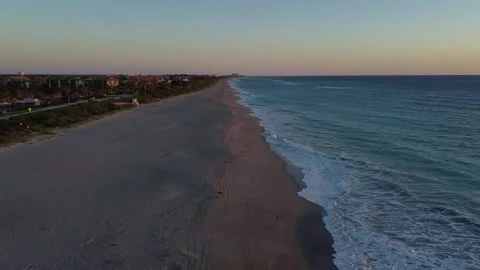 Flying over the beach at sunrise Stock Footage 274107181