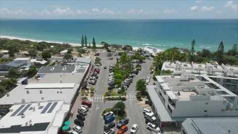 Flying over a beach town Stock Footage 291322136