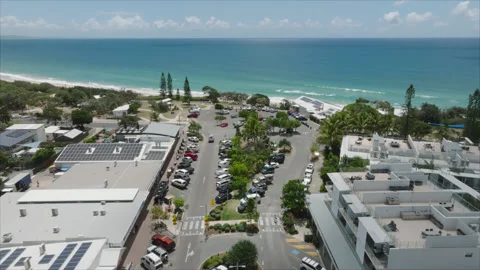Flying over a beach town Stock Footage 291622321