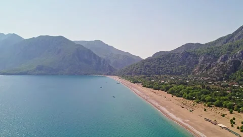Flying over the Beach in the warm sunset light Stock Footage 260810219