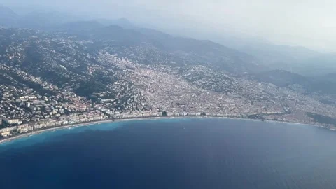 Flying over beautiful beach in Nice city in France 動画素材 251458591