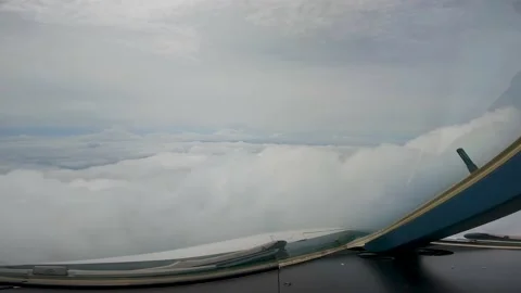 Flying over beautiful clouds plane view Stock Footage 231657484