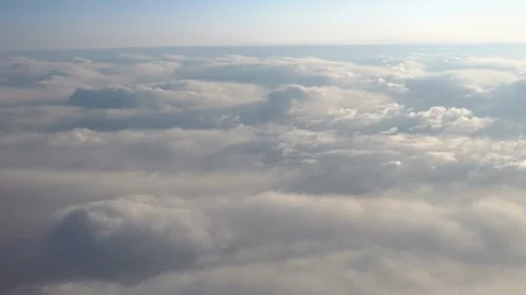 Flying over beautiful clouds at sunset. Amazing view Stock Footage 122486535