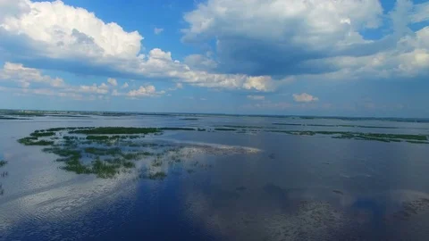 Flying over beautiful lake Видео 71326412