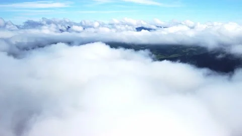 Flying over a beautiful ocean of clouds. Amazing natural landscape, 4K aerial Stock-Footage 217368698