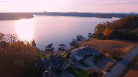 Flying over the beautiful River and houses Stock Footage 70471084