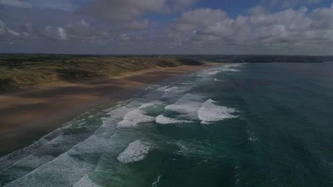 Flying over beautiful sandy beach, aerial seaside landscape with sea and waves Stock Footage 75926504