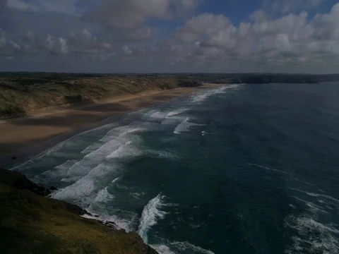 Flying over beautiful sandy beach, aerial seaside landscape with sea and waves 스톡 동영상 77589673