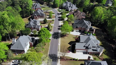 Flying over a beautiful Sub division with a golf course in suburbs of USA Stock Footage 147130034