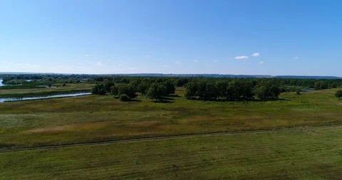Flying over the beautiful summer trees about river. 스톡 동영상 93995655