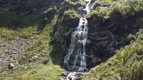 Flying over the beautiful waterfall Stock Footage 194676448