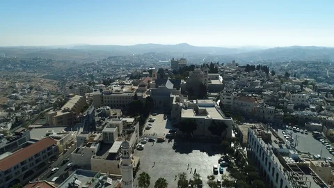 Flying over Bethlehem municipality square and Church of Nativity. DJI_0082-02 Video stock 104496545