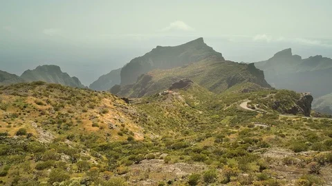 Flying over big deep canyon towards mountain peak. Masca, Tenerife, Spain Video stock 90630584