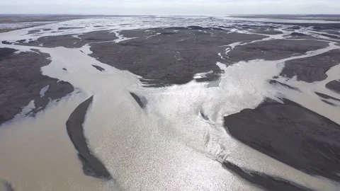 Flying over a big glacial river, Iceland. Aerial view Stock Footage 194468226