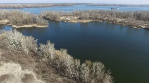 Flying over  big river, coast and cargo ship Video stock 61300079