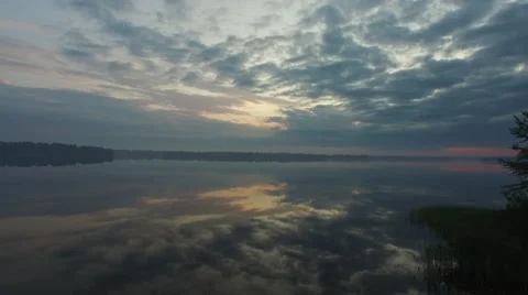 Flying up over the big river at dawn Stock Footage 63503672