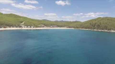 Flying over the blue sea surface in the azure lagoon. Tropical sea. Travel Video stock 101243737