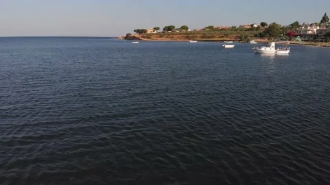 Flying over the blue sea surface of the Mediterranean Sea, summer vacation. Stock Footage 198986727