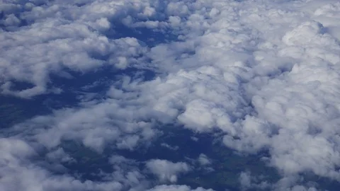 Flying over blue sky with clouds view from the plane Stock Footage 71100916