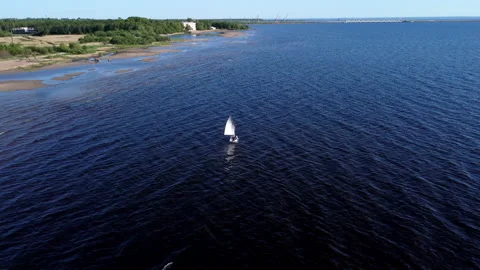 Flying over a boat with a sail Stock Footage 154948633