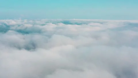 Flying over boring white clouds Stock Footage 146936043