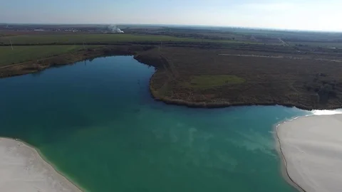 Flying over of the boundary between industrial and agricultural areas. Stock Footage 70526898