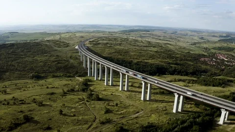 Flying over bridge in the middle of the nature Vídeos de archivo 116100328