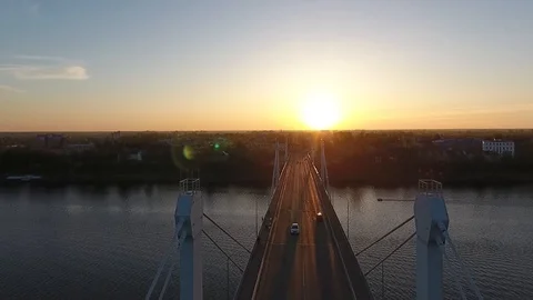 Flying over the bridge on a summer evening Stock Footage