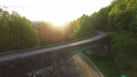 Flying Over a Bridge into the Sunset #2 Stock Footage 128546878