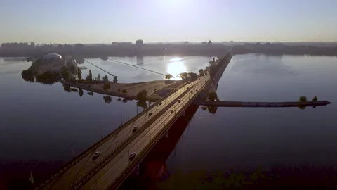 Flying over the bridge towards the dam. Voronezh. North bridge. Cars Stock Footage 139253932