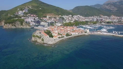 Flying over Budva Montenegro old town and medieval cathedral Stock Footage 78007115