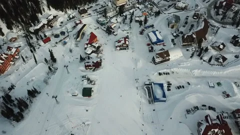 Flying over buildings in the mountains Stock Footage 88231289