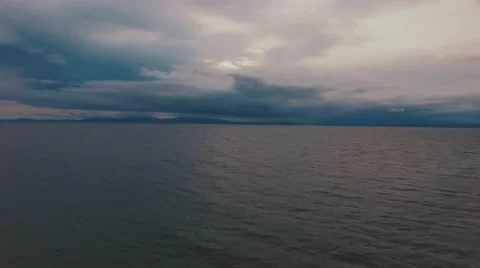 Flying over calm ocean Stock Footage 65510283