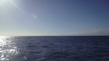 Flying over the calm ocean Stock Footage 86155042