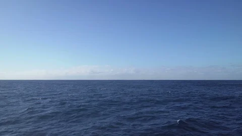 Flying over the calm ocean Stock Footage 86155904