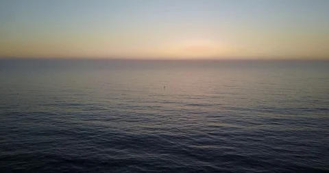 Flying over a calm Pacific Ocean Stock Footage 83460983