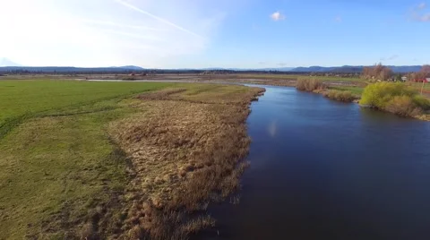 Flying Over Calm River - Drone Stock Footage 61526515