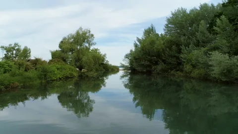Flying over a calm river Stock Footage 158979511