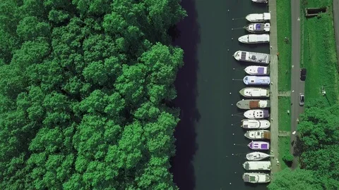 Flying over canal du midi,boat road harbor Castet en dorthe, France Stock Footage 99396917