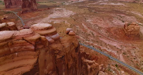 Flying over the canyon and plain in the national park of America. Speed highway  Stock Footage 212120567