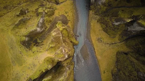 Flying over a canyon with river Video stock 85625998