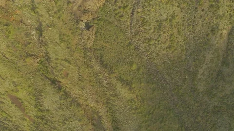 Flying over a canyon while looking straight down at the landscape as you fly  Stock Footage 131754778