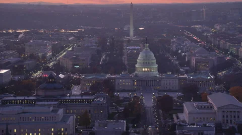 Flying over Capitol Hill at dusk, passing Library of Congress and Supreme Court Stock Footage 59190478
