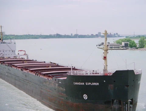 Flying over cargo ship on river 1989 Video stock 136122970