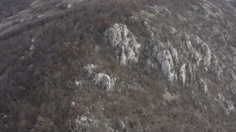 Flying over Carpathian mountain ranges by winter 4K drone video Stock Footage 102777036