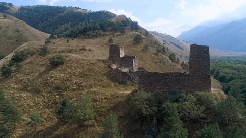 Flying over a castle in the mountains Stock Footage 121736437
