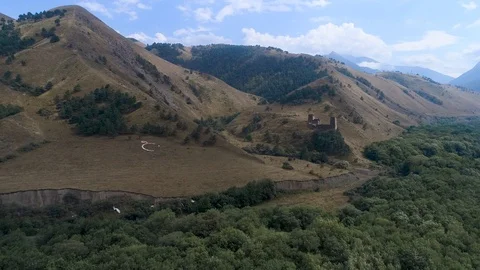 Flying over a castle in the mountains Stock Footage 121736523