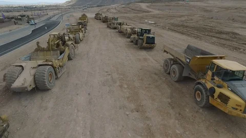 Flying over Caterpillar Construction Equipment Stock Footage 88568020